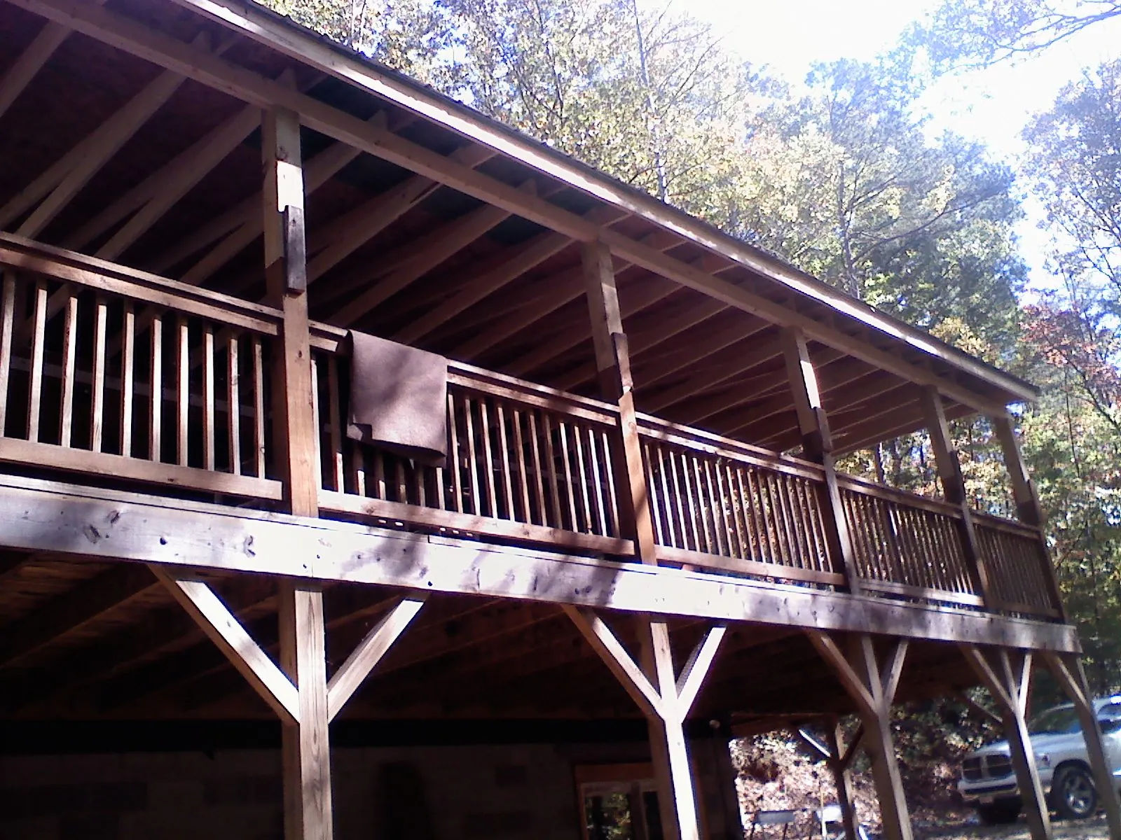 Timber framing under a new elevated porch and deck — Roof Leak Repair in Richmond Hill by Roofing Brothers